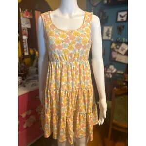 Adorable, comfortable sleeveless dress with blue pink and yellow flowers